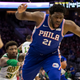 Illustration for article titled I Cant Stop Looking At This Photo Of Marcus Smart Nonchalantly Shoving Joel Embiid